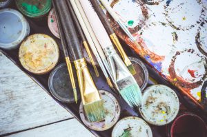 paint brushes and paint for art