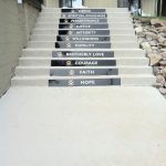 stairs outside of building with 12 Steps plaques on them - English Mountain Recovery